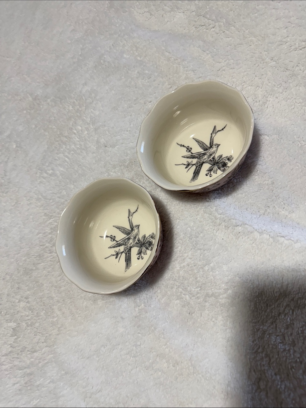 222 Fifth pink and gold Ceramic Bowls with Black Bird Motif $40 set of 2.